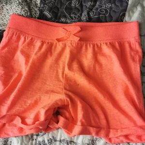 Orange ish pink shorts